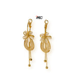 Pendientes con borlas de flores y piedra de ojo de gato