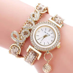 Reloj FanTeeDa con correa de cuero y remaches de diamantes de imitación para mujer